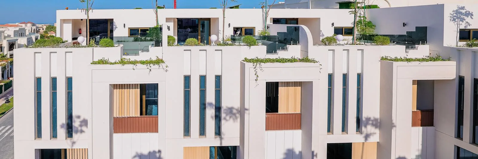 Giardino Villa exterior facade with rooftop planting