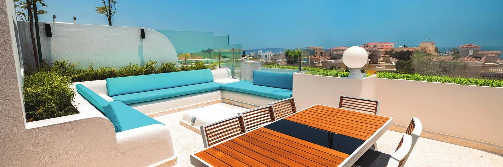 Rooftop lounge with BBQ and views of The Pearl Qatar
