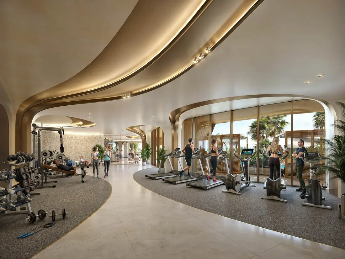 Fitness centre with curved ceiling and sea-facing glazing