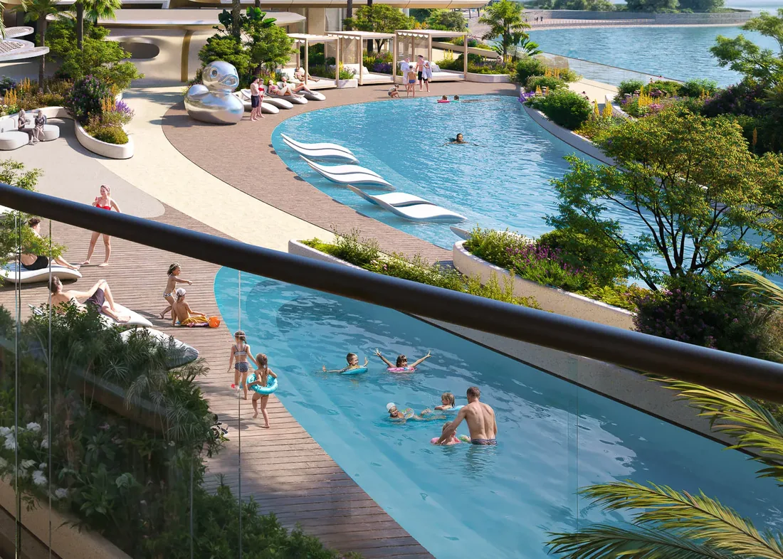Sun lounger and cabana terraces beside the lagoon pool at The Grove