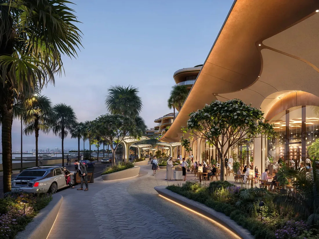Shaded retail and dining promenade at The Grove with palms and pedestrians