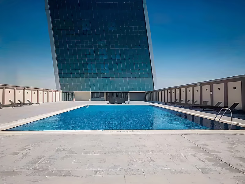 Luxury Living in Zigzag Tower | 2BR + Maid | Residency Included - Photo 2