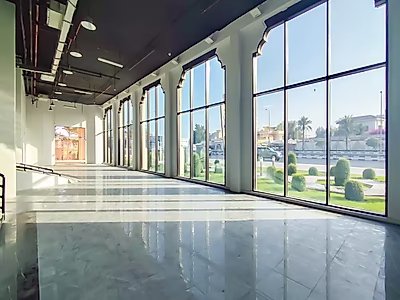 PRIME LOCATION || HIGH CEILING SHOWROOM || PANORAMIC WINDOWS || DEDICATED BASEMENT PARKING