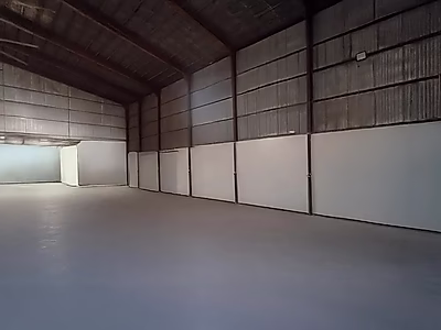 عائد استثمار صافٍ 10% - كراج للبيع | موقع متميز في منطقة صناعية