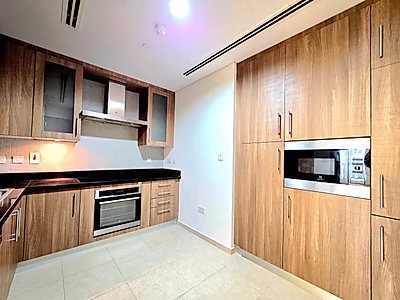 Modern 2BR | Closed Kitchen | Balcony | Title Deed
