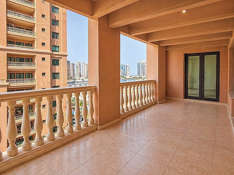 Spacious 2BR in Porto Arabia | Large Balcony & Partial Marina View | Great Value - Photo 5