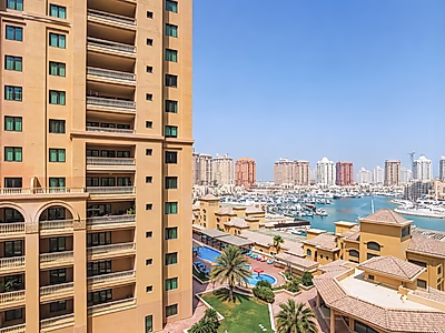 Spacious 2BR in Porto Arabia | Large Balcony & Partial Marina View | Great Value