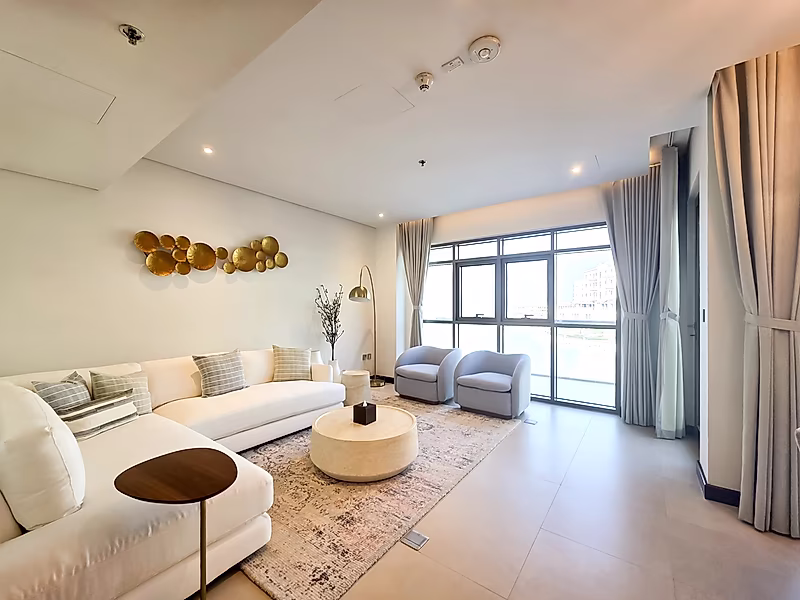Elegant 2BR Duplex in The Pearl | Luxury Furnished | Beach Access - Photo 11