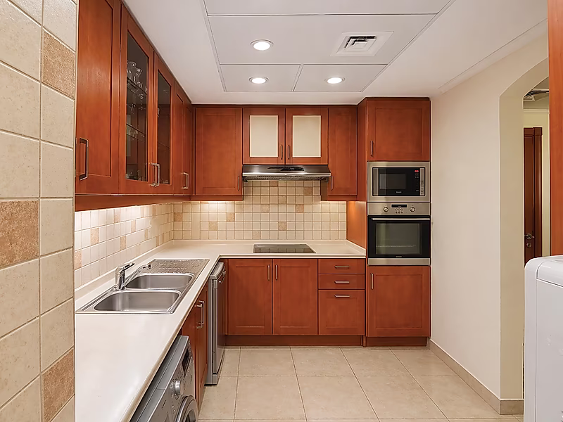 Spacious 2BR in Porto Arabia | Large Balcony & Partial Marina View | Great Value - Photo 7