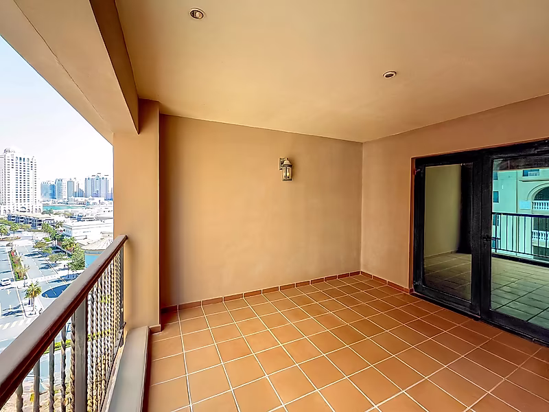 Best Price in Porto Arabia | Large 1BR with Balcony in Premium Tower - Photo 6