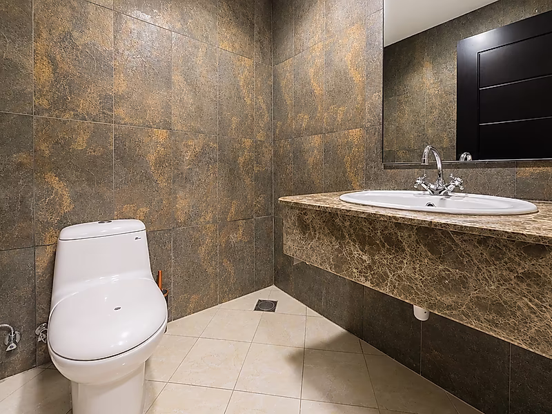 Spacious 1-Bedroom in Premium Tower | Balcony & Luxury Living - Photo 9
