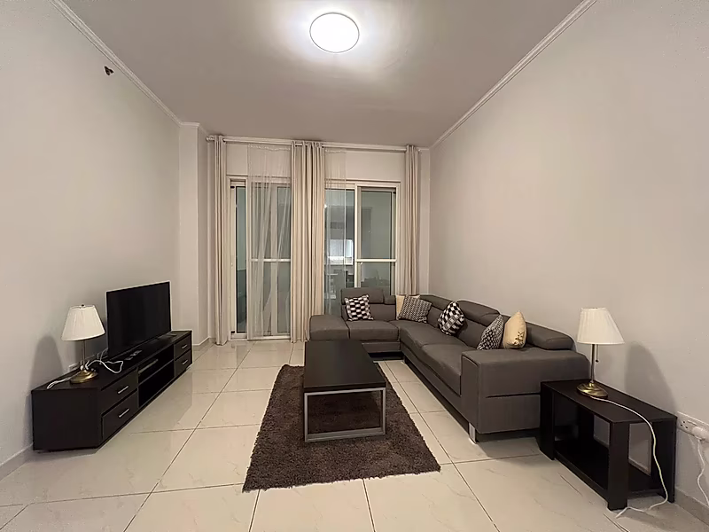 Elegant Fully Furnished 1BR | Beach Access | Pool & Gym - Photo 1