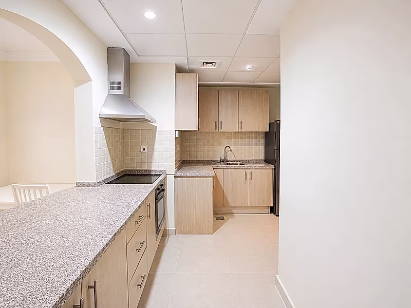 STYLISH AND CLEAN 1-BEDROOM IN THE PEARL - Photo 11