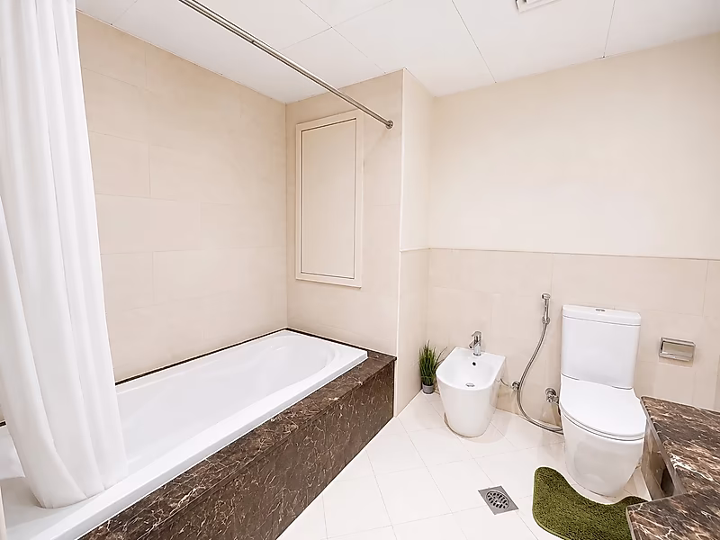 STYLISH AND CLEAN 1-BEDROOM IN THE PEARL - Photo 14