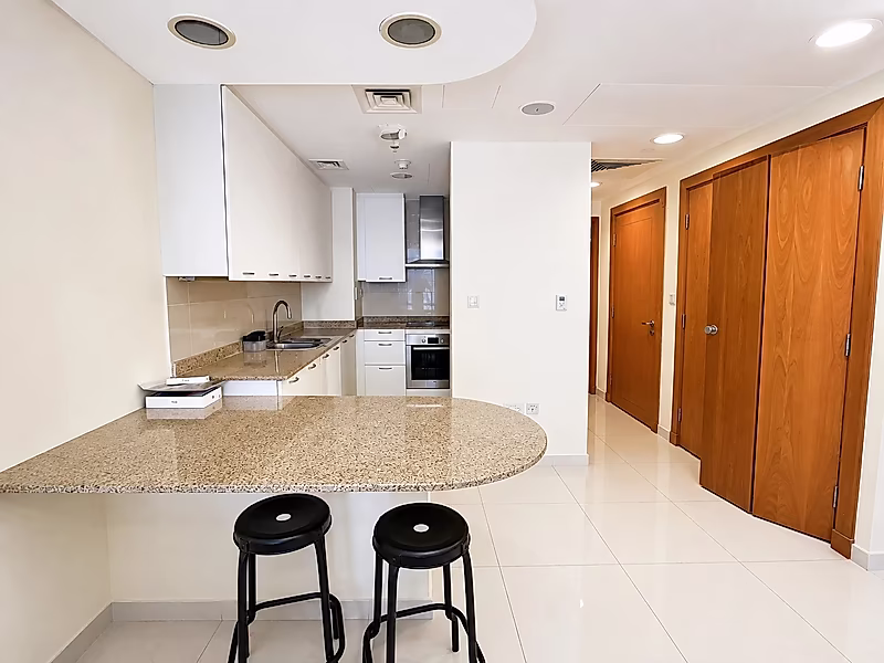 WELL-MAINTAINED STUDIO WITH BALCONY AND AMENITIES - Photo 5