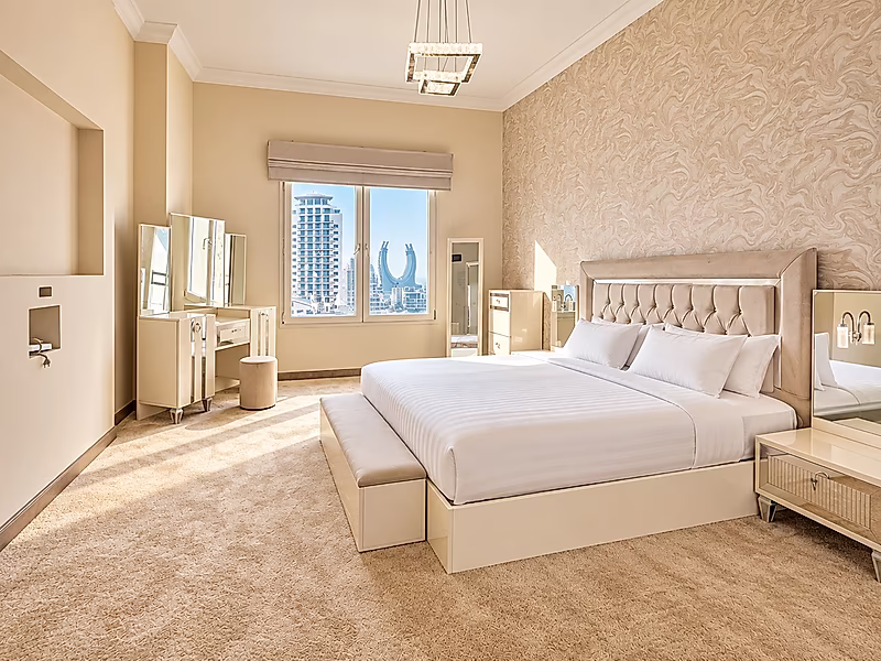 Luxury Living in Porto Arabia | 3BR with Balcony Views - Photo 3