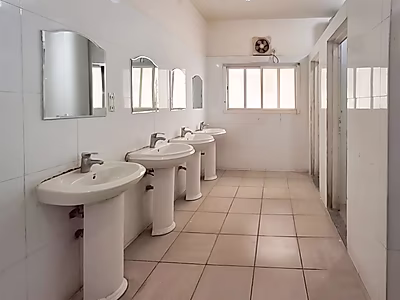 For Sale: Labor Camp with 42 Rooms and 3 Warehouses in Prime Industrial Area