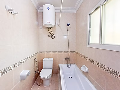 شقة أنيقة من غرفتين وحمامين للإيجار | منطقة المطار القديم